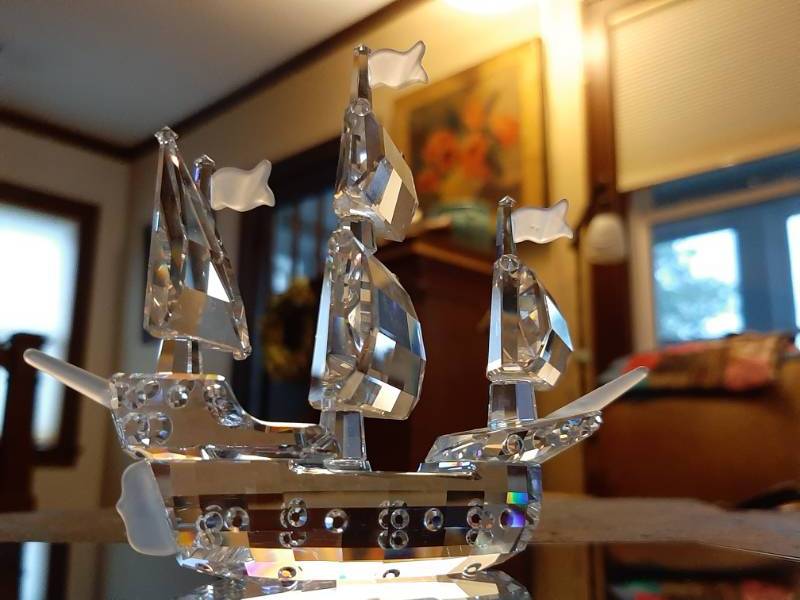 lot 65 image: Swarovski Crystal Santa Maria Sailing Ship Figurine w Stand NIB Retired