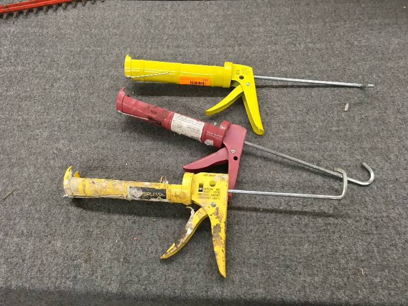 lot 227 image: Three Caulking Guns