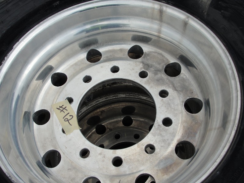 2-  TIRES  RIMS FIRE DAMAGED SUGGESTED FOR FARM IMPLEMENT USE
