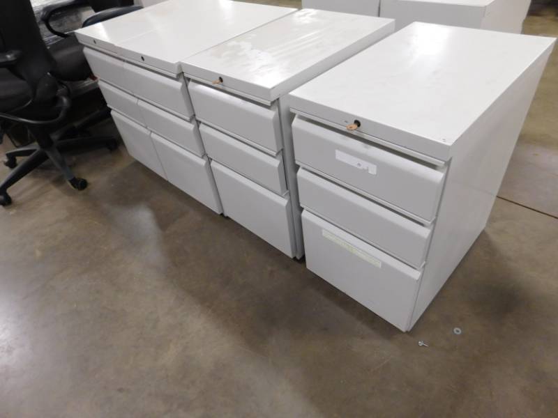 lot 103 image: Four File Cabinets - 15(w) x 27(h) x 23(d)