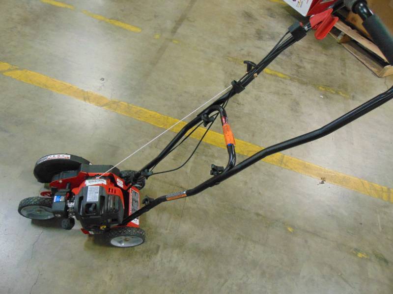lot 37 image: Troy-bilt 9 in. 29cc 4-Cycle Gas Walk-Behind Edger with Jumpstart Capabilities TB516 EC
