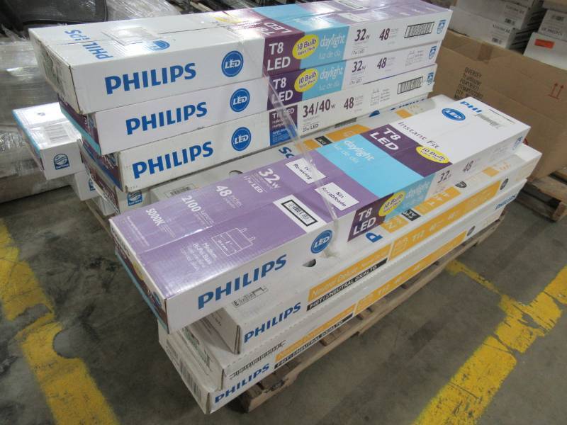 lot 103 image: Pallet of 48 Philips T8 LED and T12 Florescent Light Bulbs.