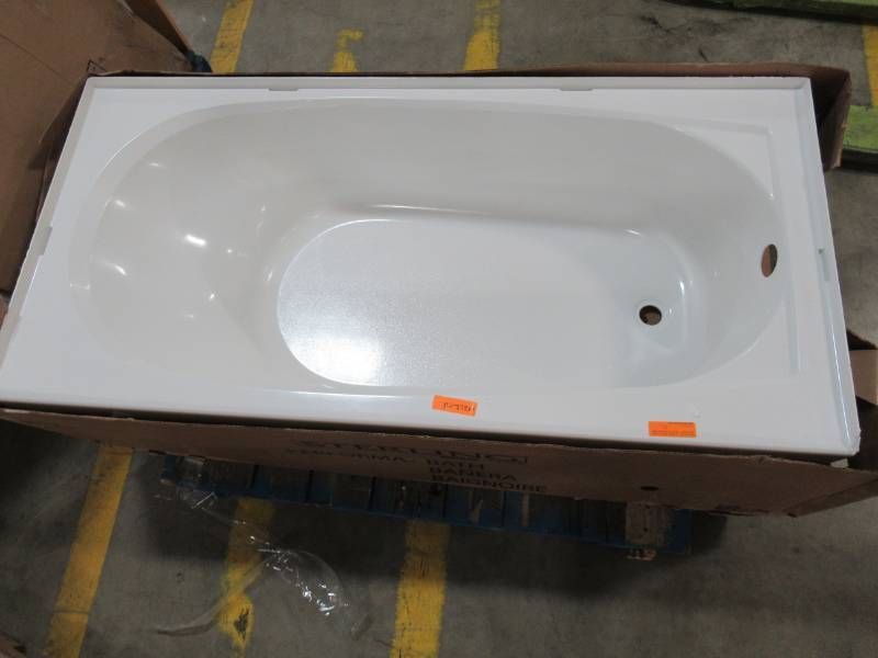 lot 36 image: Sterling Performa 60-in White Vikrell Rectangular Right-Hand Drain Alcove Bathtub - Cracked on threshold and extends into tub.