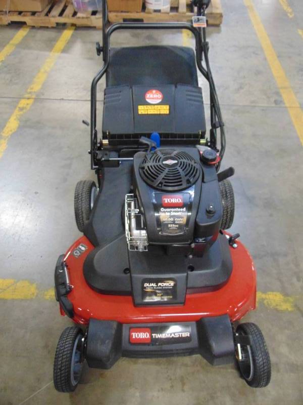 lot 75 image: Toro TimeMaster 30 in. Briggs & Stratton Electric Start Walk-Behind Gas Self-Propelled Mower with Spin-Stop 21200