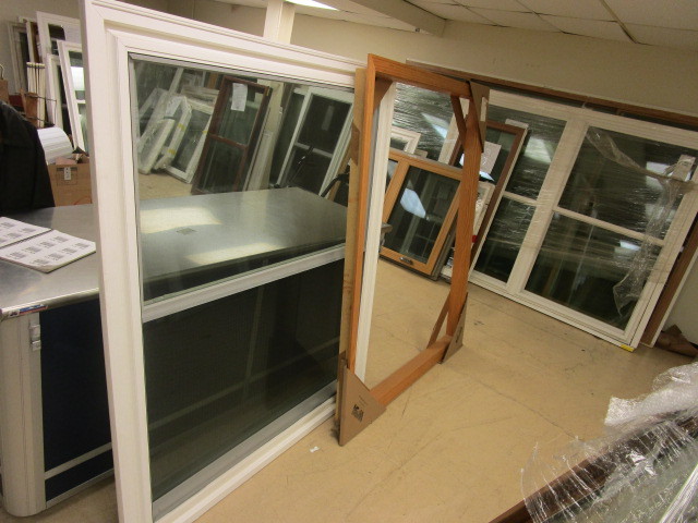 DOUBLE HUNG WINDOW WITH CUSTOM OAK FRAME