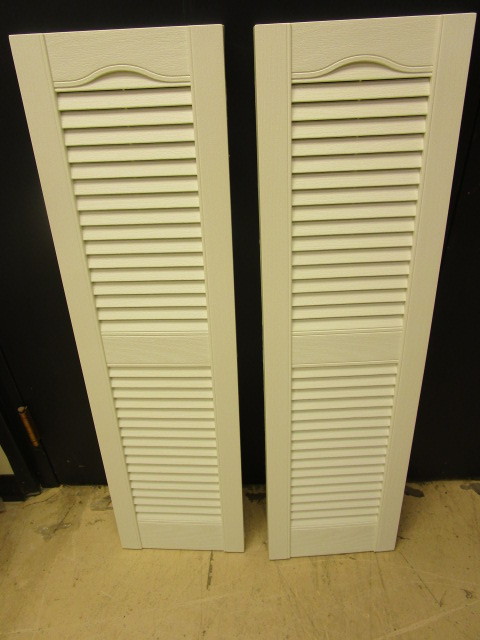 WHITE SHUTTERS WITH LOUVERS