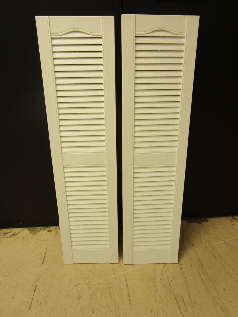 WHITE SHUTTERS WITH LOUVERS