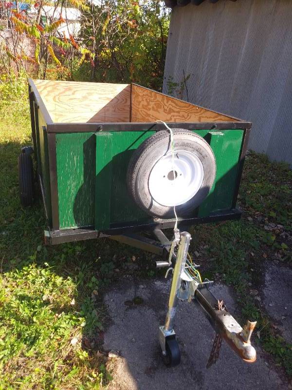 lot 23 image: 4X8 TRAILER WELDED STEEL FRAME WITH NEW HEAVY LOAD TIRES, SPARE, LIGHTS, MOTORCYCLE CHOCK. - (NO LICENSE OR TITLE) - SEE PICTURES