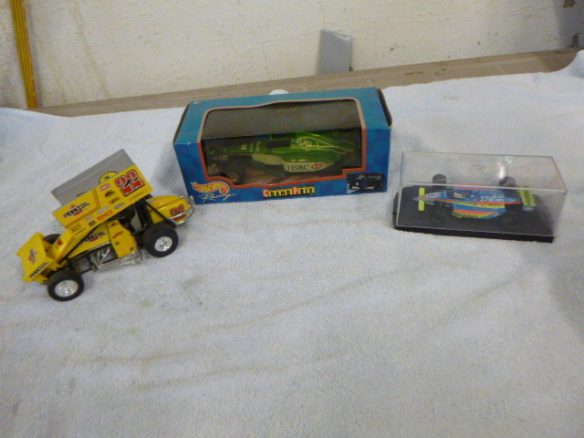 lot 14 image: 3 Small Die-Cast Racing Cars