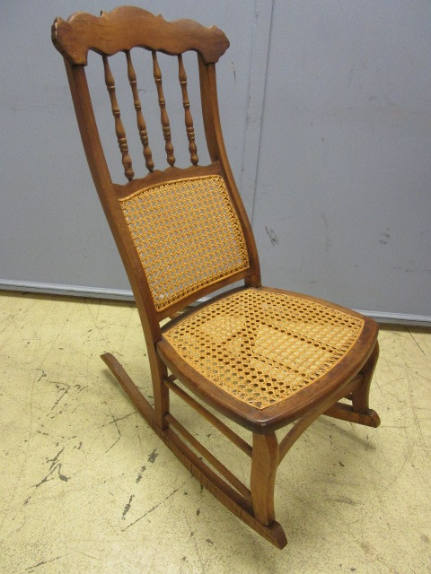 lot 434 image: ANTIQUE SOLID WOOD ROCKING CHAIR WITH CANE SEAT AND BACK