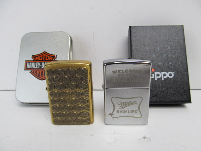 lot 32 image: Pair of Harley-Davidson  & Miller High-Life Beer ZIPPO Lighters wBoxes