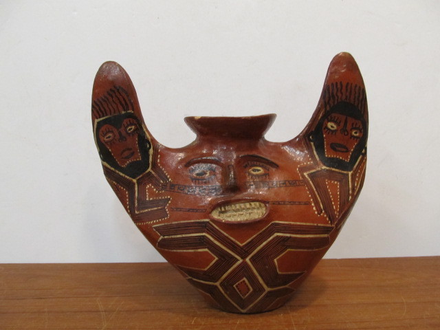 lot 161 image: Vintage Painted Clay Double Sided Face Jug