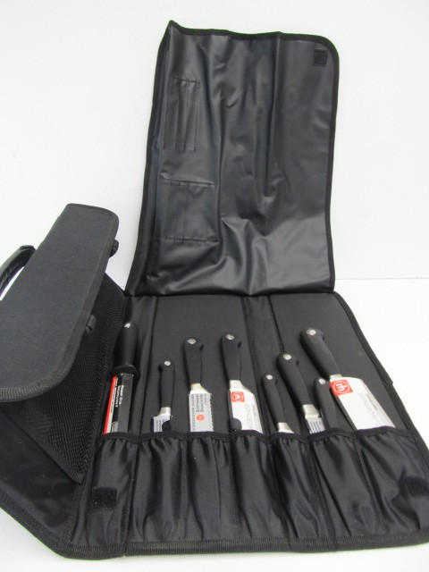 lot 99 image: Wusthof German Solingen Complete Knife Roll Set