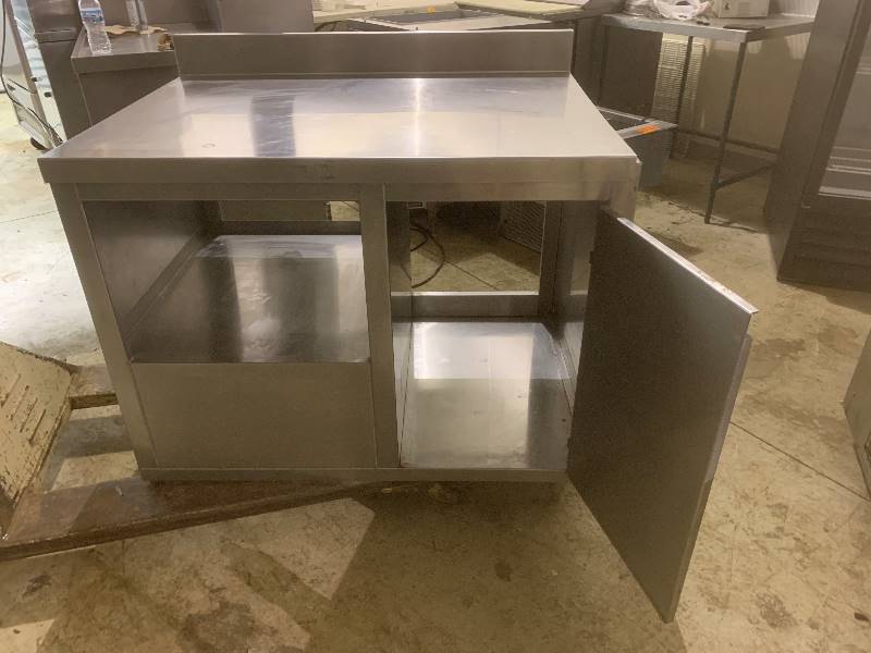 lot 46 image: Stainless steel custom worktable, 24x36x37.5H,