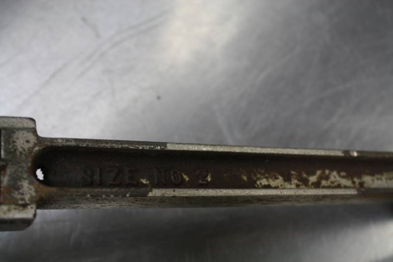 lot 157 image: Can opener with bracket