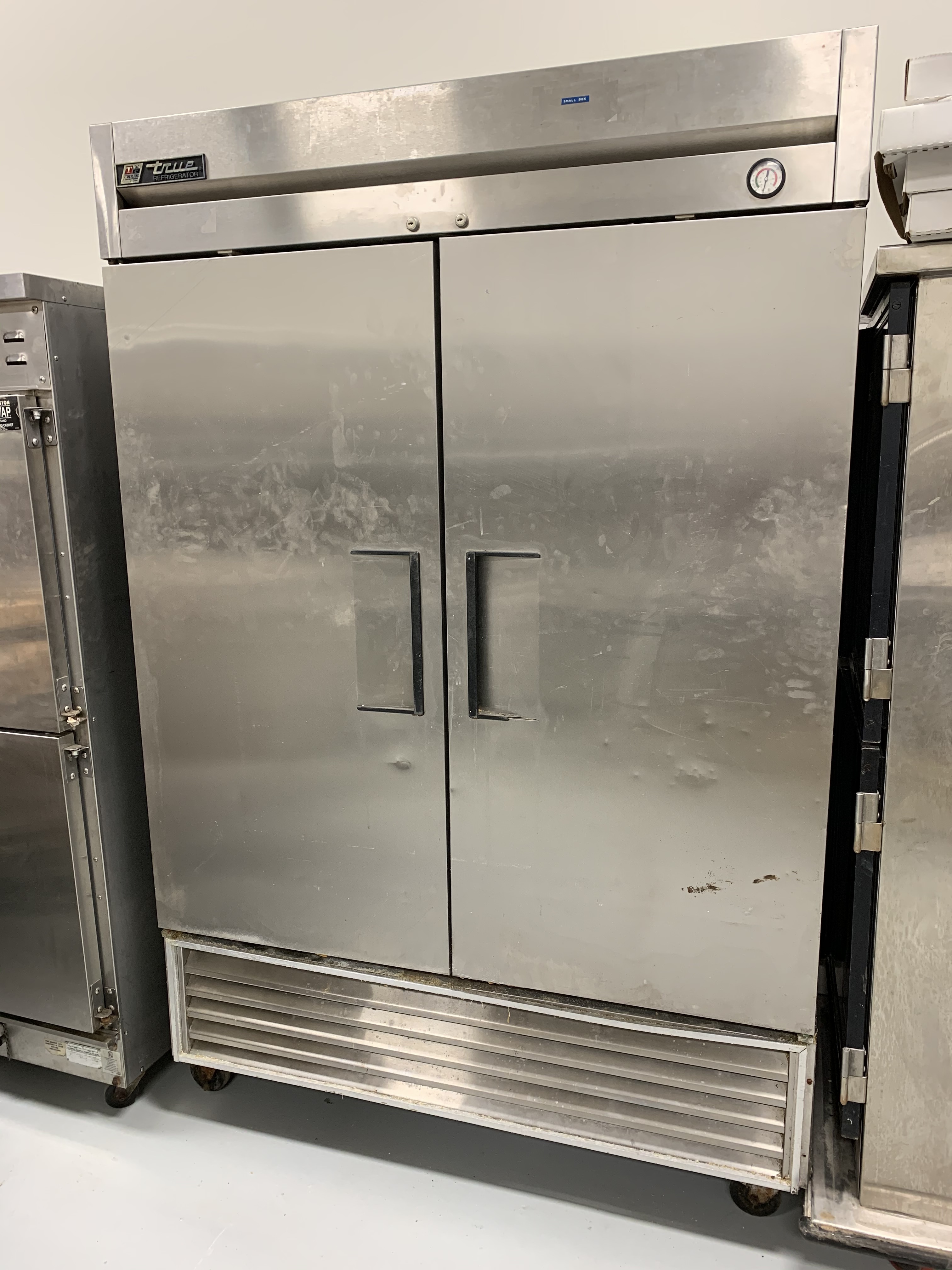 lot 12 image: True 2 Door Stainless Steel Cooler on Casters - Model # T-49 - 115 Volts - 9.2 Amps - 54 x 29.75 x 83.25 - NSF Approved