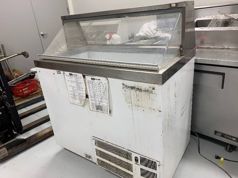 lot 42 image: MasterBilt OW52420348inch self-contained ice cream dipping cabinet with display top 115V 7.5 amps48X24X54 Runs Freezes
