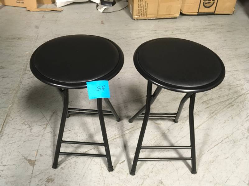 lot 54 image: 24 in. Black Cushioned Folding Stool 300lb Weight Limit by Trademark Home in very good condition