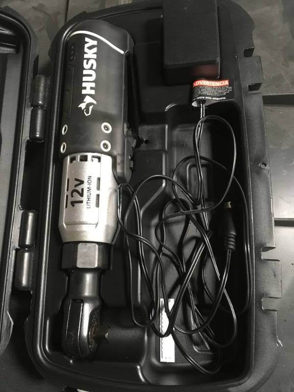 lot 93 image: Husky 38 in. Drive 12-Volt Lithium Ion Cordless Ratchet in very good condition