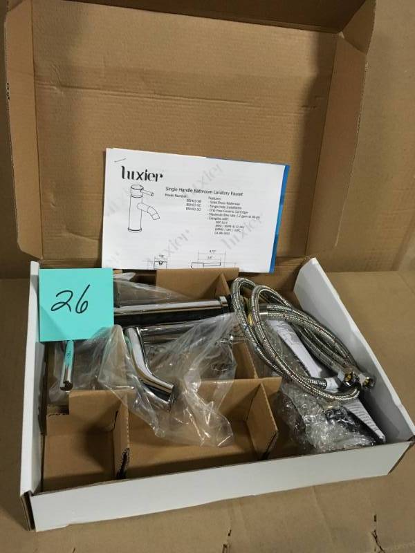 Luxier Single Hole Single-Handle Bathroom Faucet with drain in Chrome in very good condition