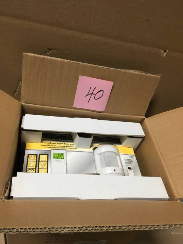lot 40 image: Defiant 8 Amp 7-Day Indoor In-Wall SunSmart Digital Timer Switch with Motion Sensor, White in good condition