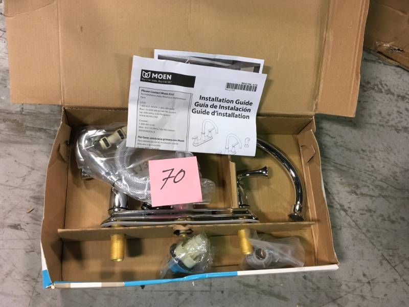 lot 70 image: MOEN Banbury 2-Handle Mid-Arc Standard Kitchen Faucet with Side Sprayer in Chrome in good condition