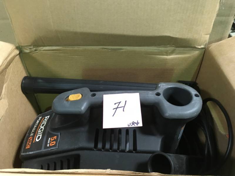 lot 71 image: RIDGID 4 Gal. 5.0-Peak HP Portable WetDry Vacuum USED