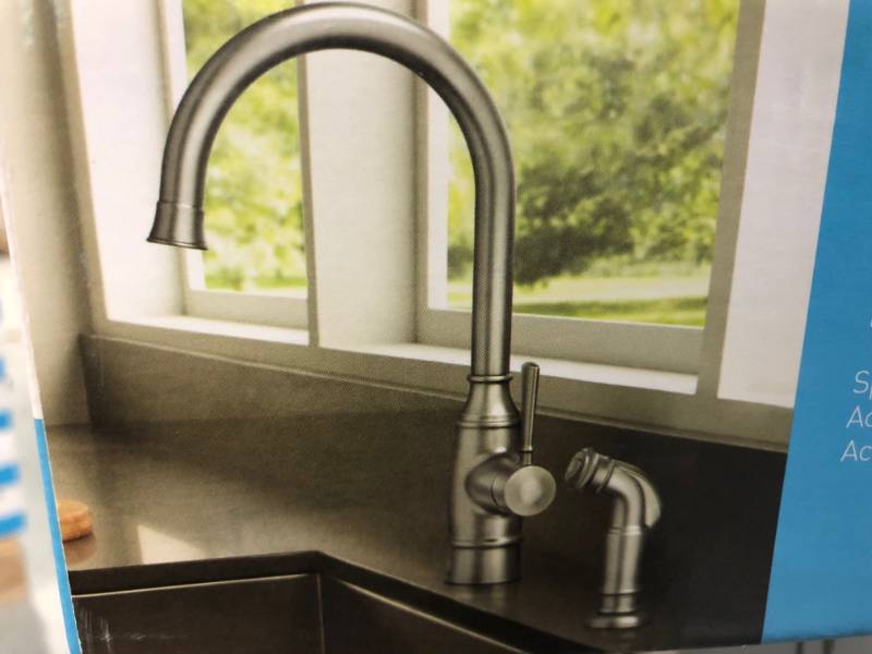 lot 108 image: MOEN Noell Single-Handle Standard Kitchen Faucet with Side Sprayer in Spot Resist Stainless in good condition