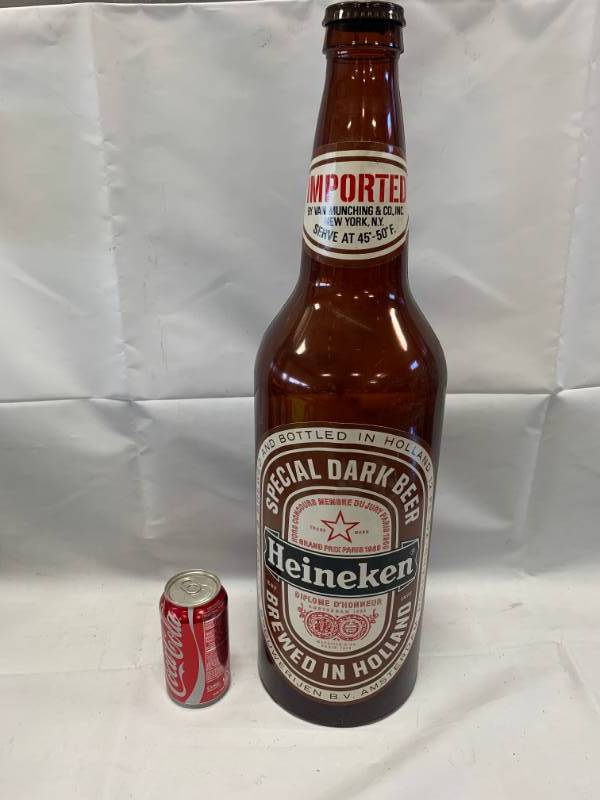 lot 13 image: Vintage Large Heineken Dark Promo Plastic Bottle