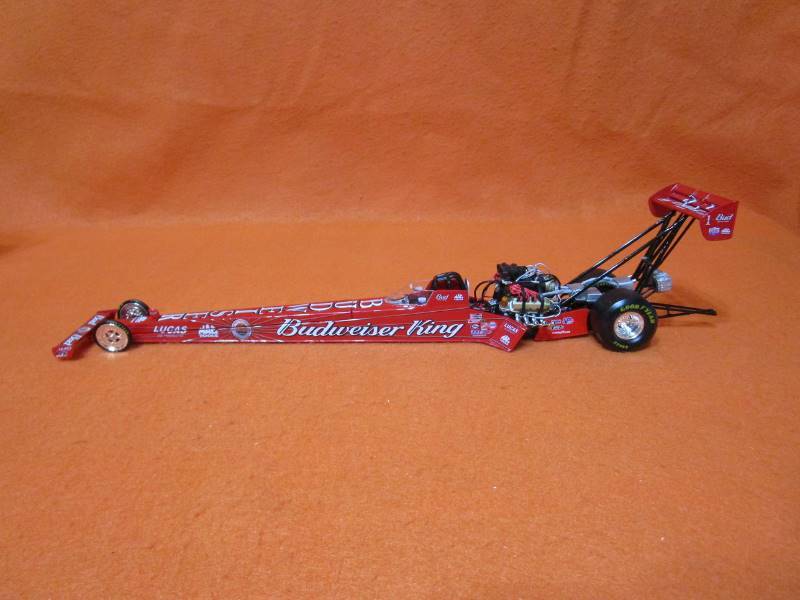 lot 73 image: Kenny Bernstein Budweiser Forever Red Dragster 124th Action Diecast