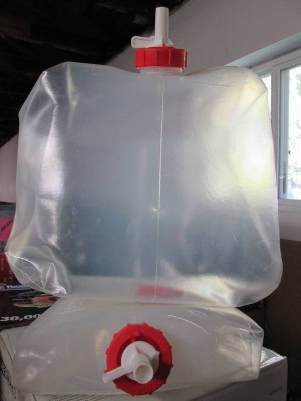 lot 228 image: Reliance 5 Gallon Collapsable Water...