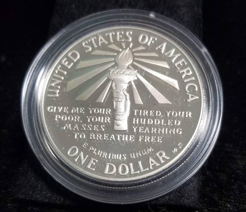 1986 US ELLIS ISLAND COMMEMORATIVE SILVER DOLLAR