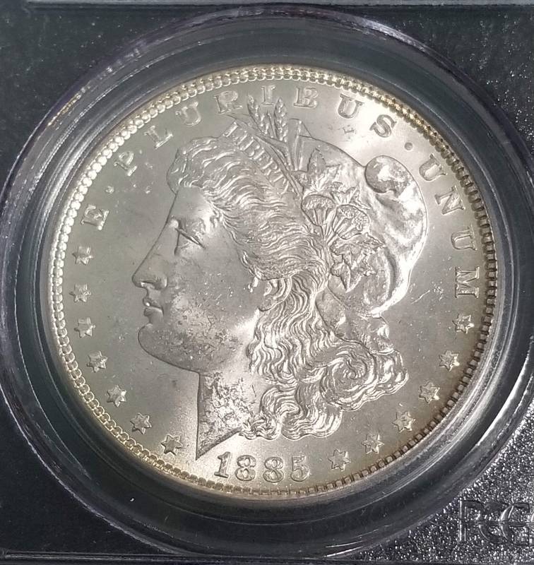 1885 MORGAN SILVER DOLLAR MS62 PCGS