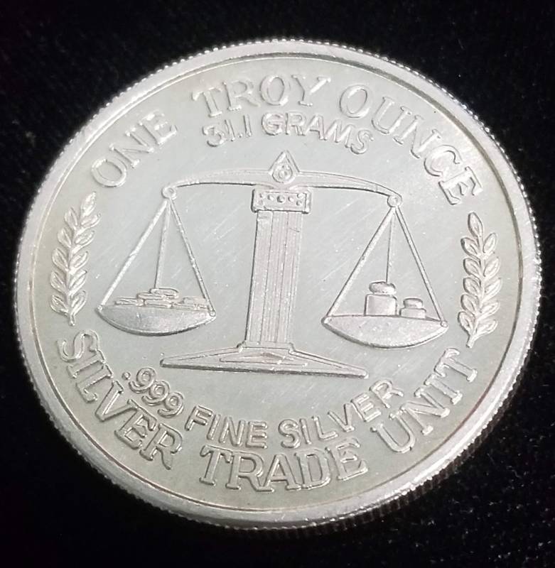 1 TROY OZ. .999 FINE SILVER MORGAN DESIGN TRADE UNIT