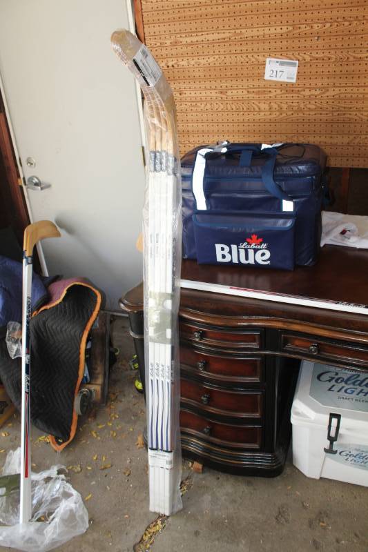 lot 241 image: Lot of (4) Labatt Blue Beer Hockey Sticks