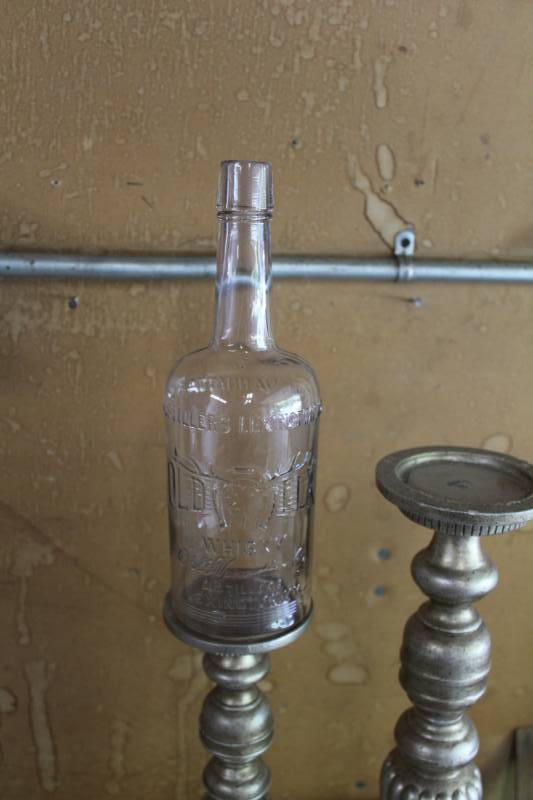 lot 296 image: Old Elk Vintage Whisky Glass Bottle