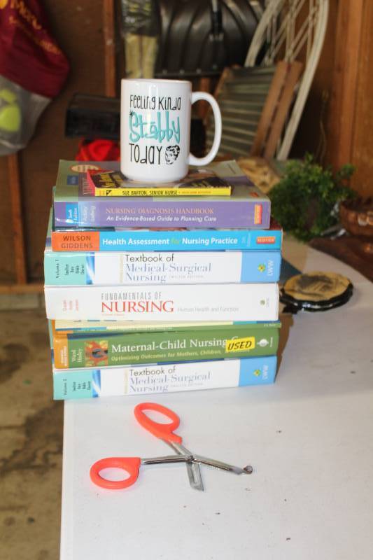 lot 304 image: Nursing Text Books, Hospital Scissors, Ceramic Coffee Mug