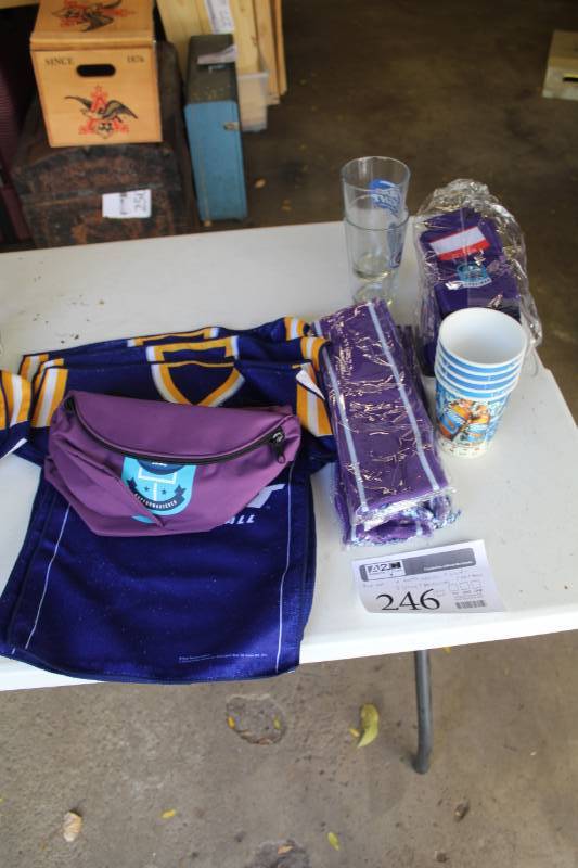 lot 246 image: Bud Light Beer Bottle Coozies, Scarves, Glasses, Plastic Cups, T-Shirt Towels, Fanny Packs