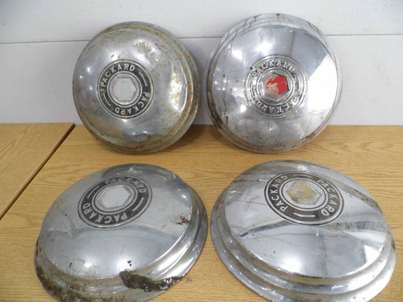 Lot of 4 Packard Hubcaps