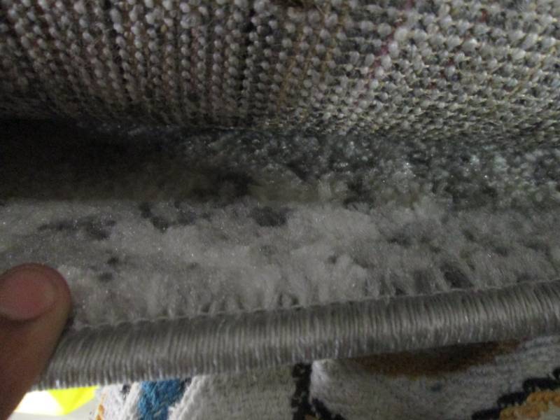 lot 12 image: nuloom smoke grey rug...