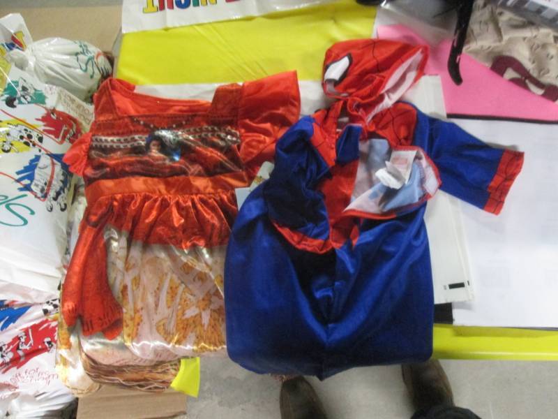 lot 46 image: moana dress and spider man costume...