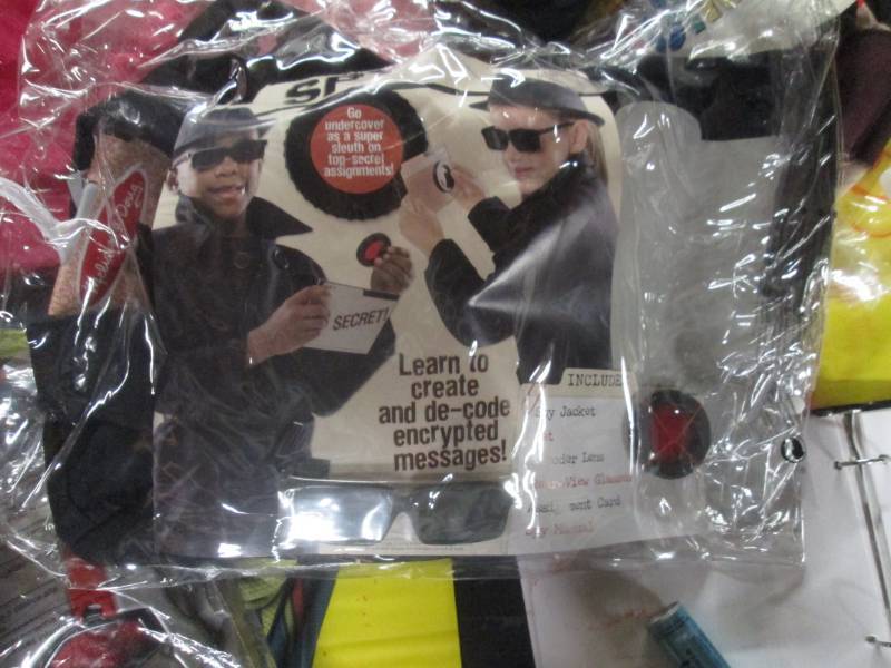 lot 57 image: spy costume...