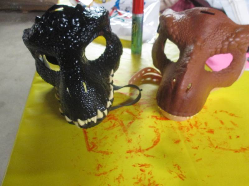 lot 84 image: lot of 2 dino mask...