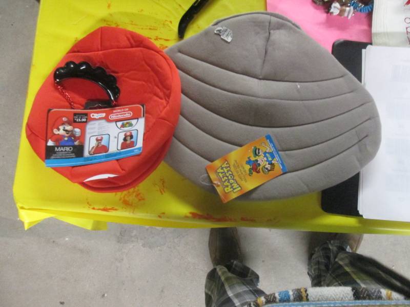 lot 92 image: mario costume and shell hat...