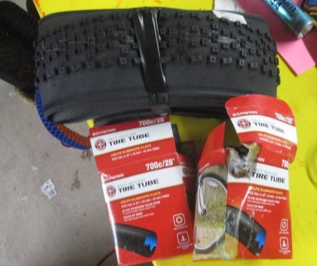 lot 131 image: lot of bike tire and tubes...