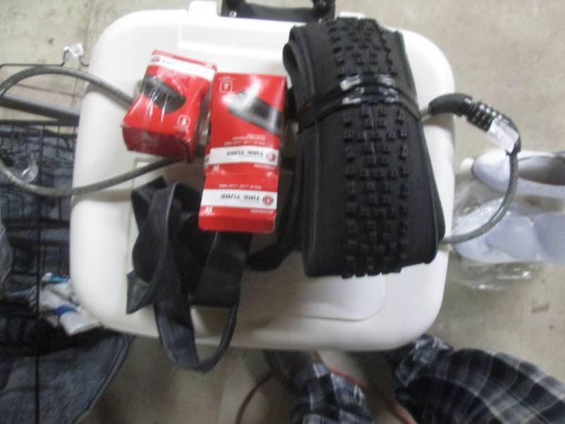 lot 132 image: lot of bike tire and tubes...