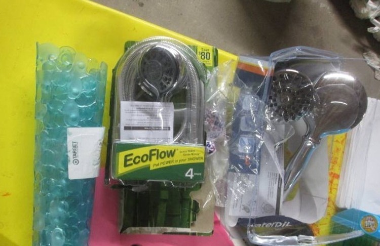 lot 164 image: lot of shower heads and bath mat...