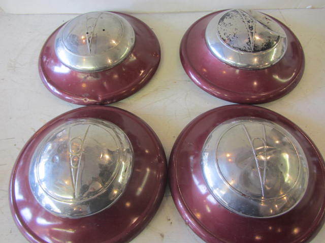 lot 53 image: Ford 1937 Hub Caps