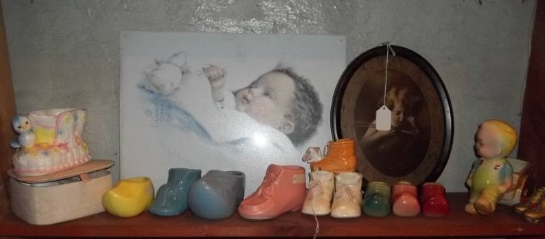 lot 215 image: Ceramic Baby Shoes