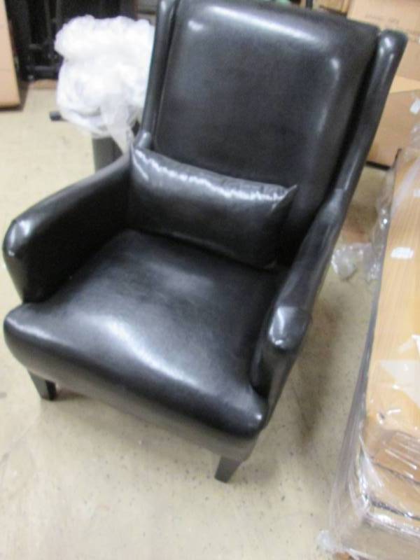 lot 23 image: Black Faux Leather Chair...